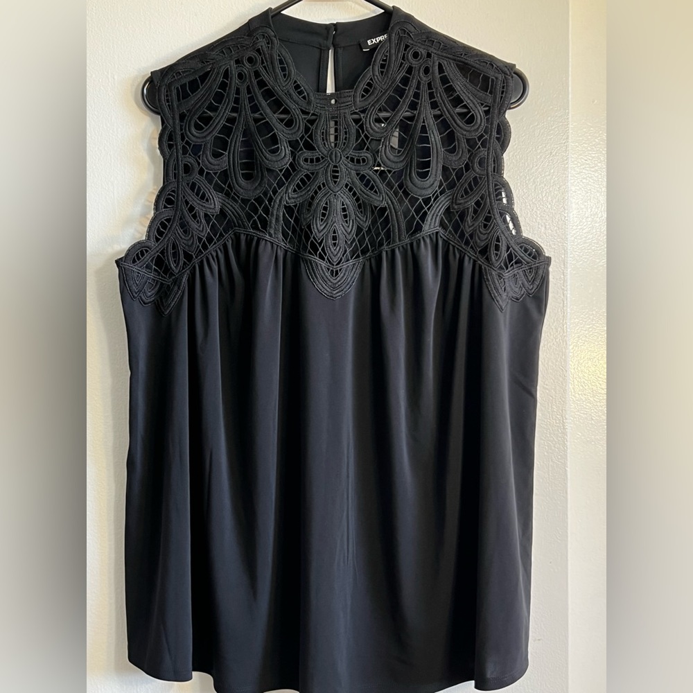 Express Black lace top. NWT. Very Good Condition. pet friendly home.